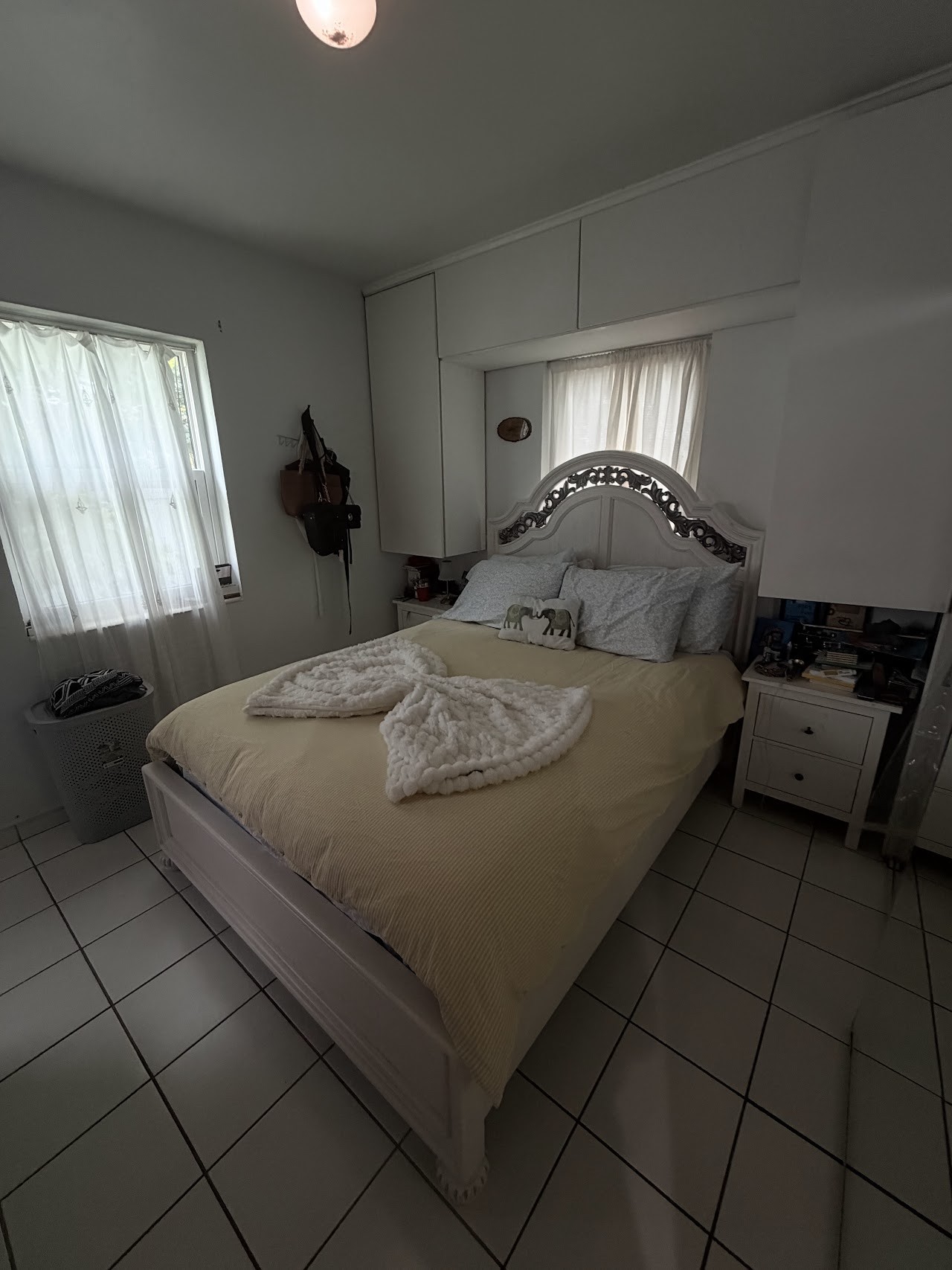 Collage of beautifully cleaned residential interiors including a gleaming kitchen, neat bedroom, spotless bathroom, and polished hardwood floor living room.